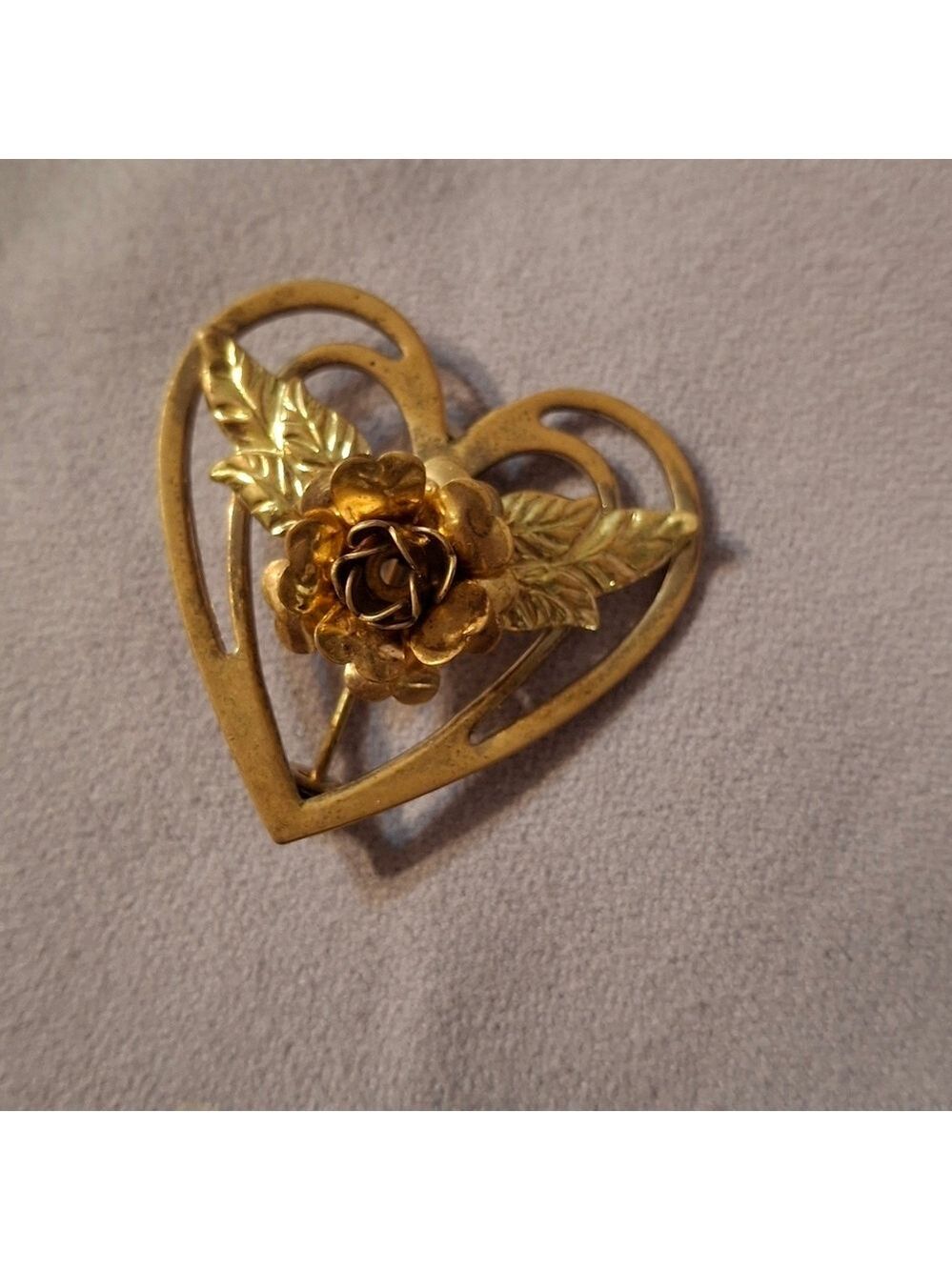 Goldtone heart brooch with rose center  Vintage